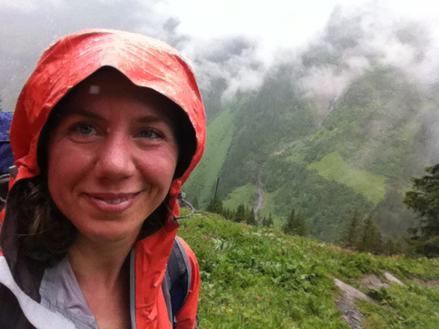 hiker in raingear in the Alps