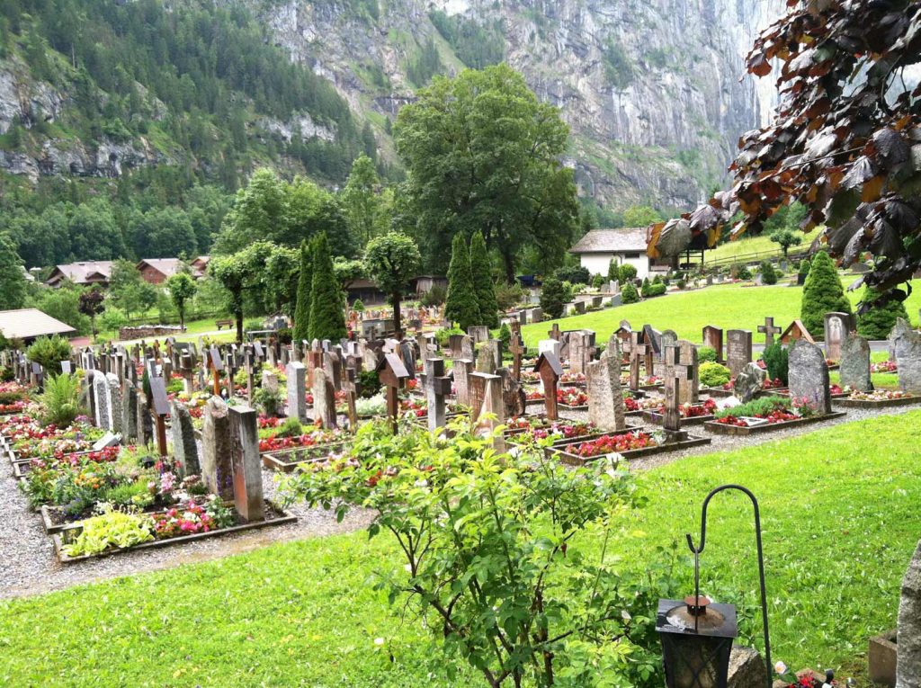 graveyard with flower beds in the Lauterbrunnen Valley, Switzerland