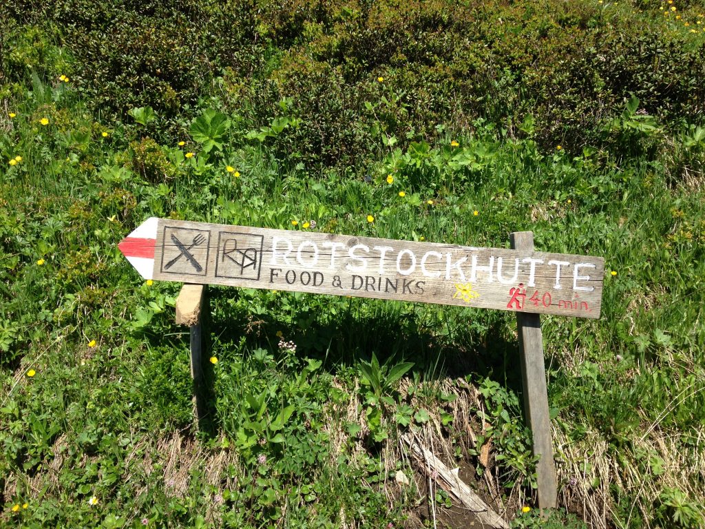 hiking trail sign for Rotstockhutte in the Swiss Alps