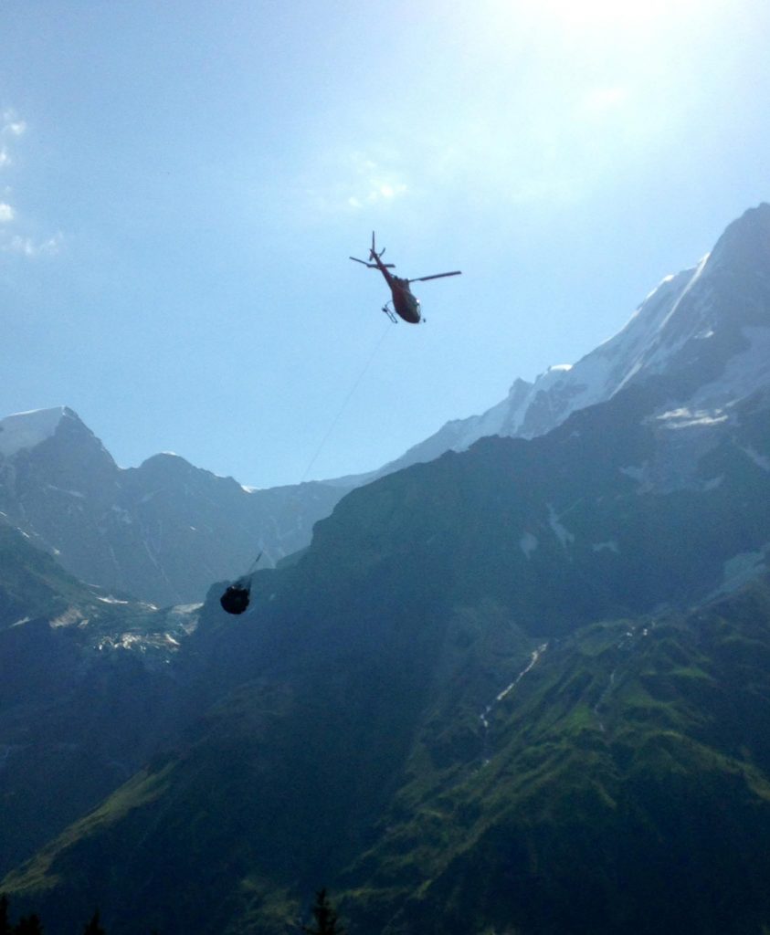 helicopter leaving Obersteinberg and flying down the Lauterbrunnen Valley