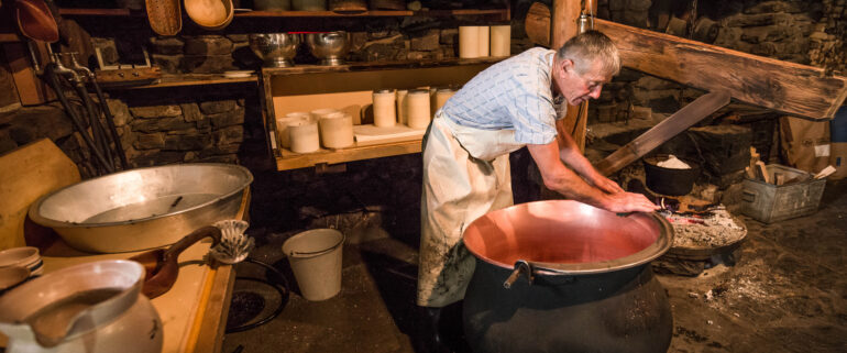 Swiss culture cheesemaking with a copper kettle
