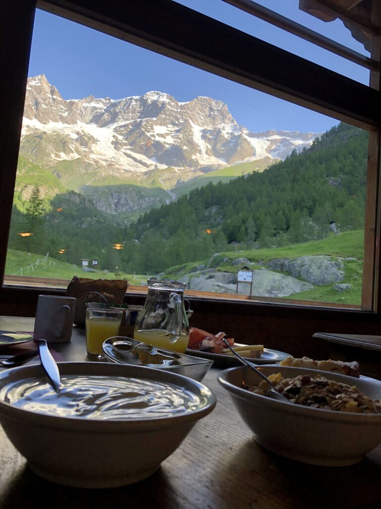 breakfast at an alpine hut with mountain view