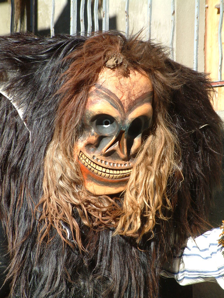 hand carved wooden mask Swiss Alps 