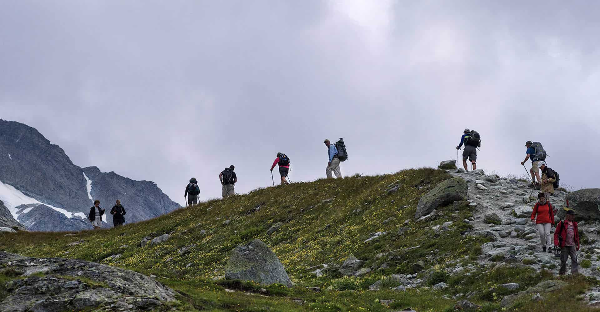 hikers on the Haute Route near Moiry, Switzerland